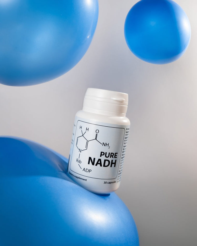PureNADH bottle resting on blue balloons