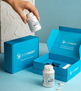 PureNADH 100mg NADH capsules with branded gift boxes and loose capsules on a blue background